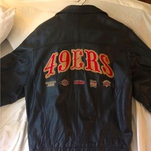 49er’s black leather jacket with cloth patches denoting all 5 Super Bowl win’s.